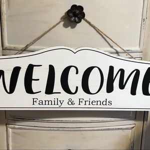 Welcome Family & Friends wooden hanging sign